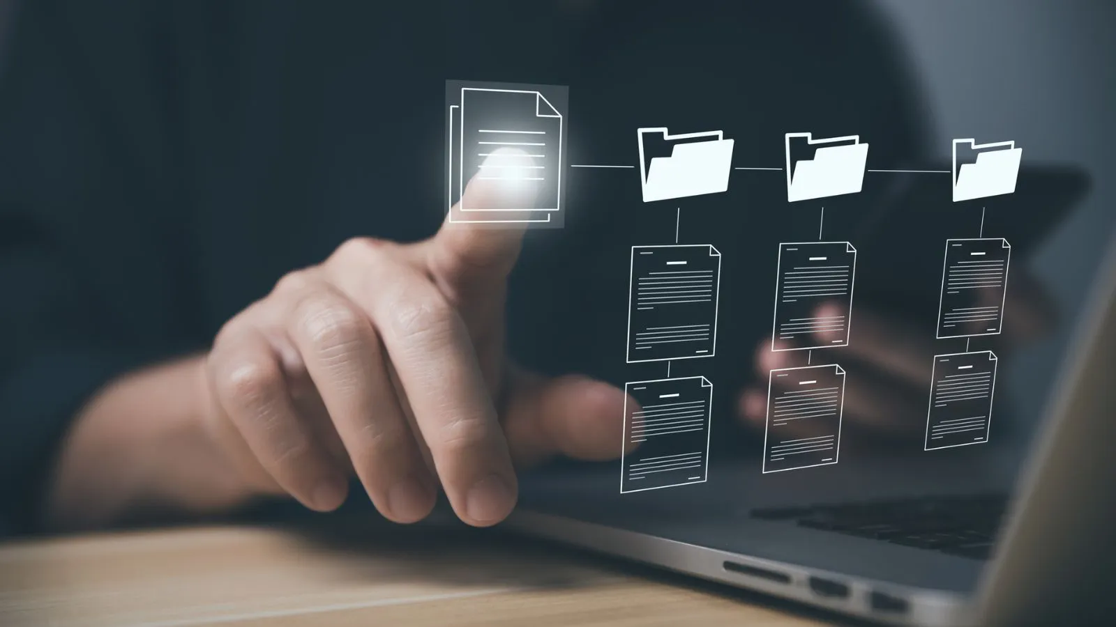 Person interacting with digital document management interface on laptop, illustrating multilingual and RTL website support services.
