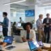 Team collaboration in a modern office focusing on digital technology and innovation