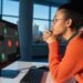 Person worried about malware on their computer, highlighting digital security concerns